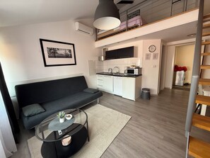 Duplex | Living area | Flat-screen TV