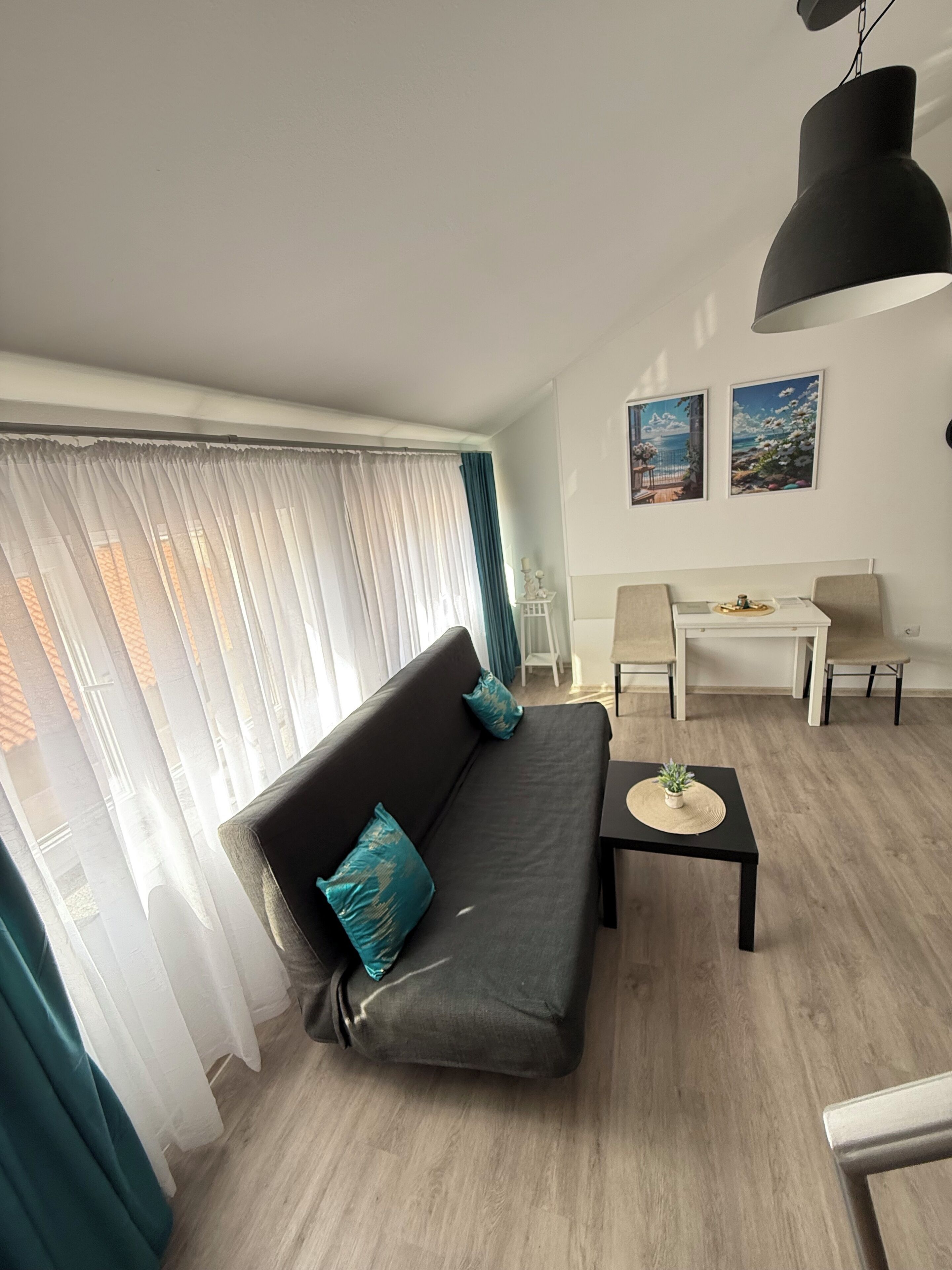 Premium Duplex | Living area | Flat-screen TV