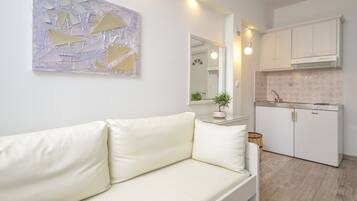 Superior Studio | Living area | Flat-screen TV