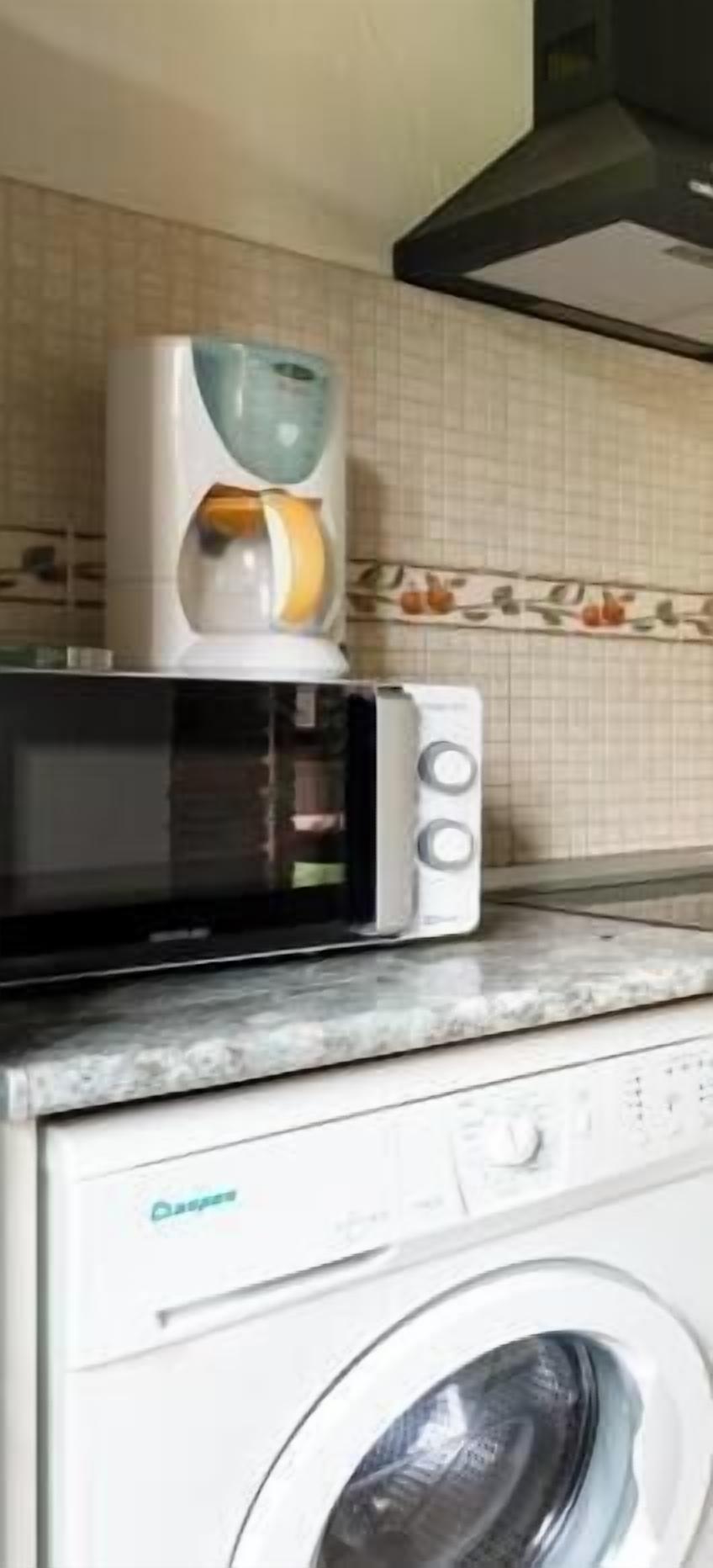 Coffee/tea maker, fridge, microwave