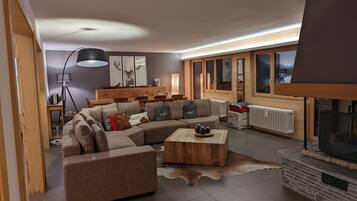 Smart TV, chimenea, reproductor de DVD y libros