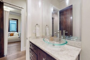 Bathtub, hair dryer, towels, soap