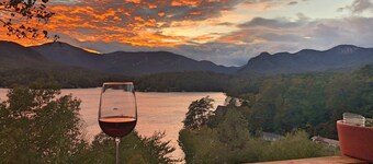 Spectacular views from modern lake front home with boathouse & pontoon available