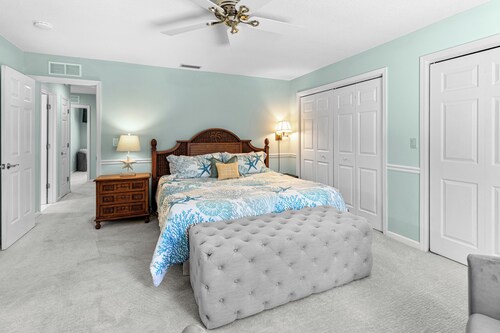 This beauty is centrally located,  with a heated pool and water fall!
