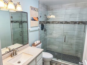 Combined shower/tub, hair dryer, towels, soap