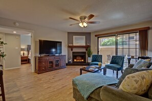 Smart TV, fireplace, DVD player, books