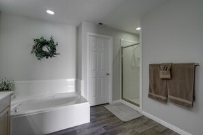Combined shower/tub, hair dryer, towels, soap