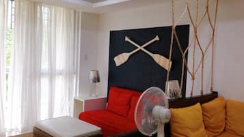 Family Suite | Living area | Flat-screen TV