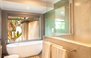 Luxury Cottage, 2 Bedrooms, Mountain View | Bathroom | Combined shower/tub, deep soaking tub, free toiletries, hair dryer