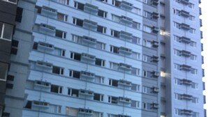 A multi-story residential building with balconies and air conditioning units. - Davao Avida Towers by JYU (Davao)