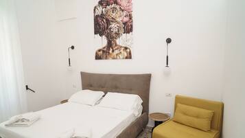 Family Triple Room, Ground Floor | Desk, iron/ironing board, cribs (free), rollaway beds (surcharge)