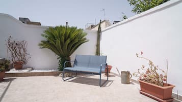 Family Triple Room, Garden View, Garden Area | Desk, iron/ironing board, cribs (free), rollaway beds (surcharge)
