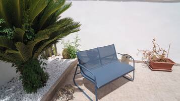 Family Triple Room, Garden View, Garden Area | Desk, iron/ironing board, free cots/infant beds, rollaway beds