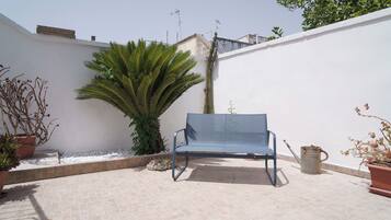 Family Triple Room, Garden View, Garden Area | Desk, iron/ironing board, cribs (free), rollaway beds (surcharge)