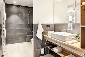 Shower, free toiletries, hair dryer, towels