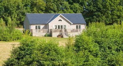 This delightful lodge on Wakes Hall Farm is a haven of peace in 500 acres of private land.