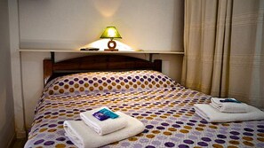 Apartamento luxo, vista para a cidade | Roupas de cama premium