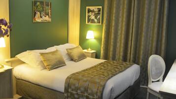 Luxe beddengoed, een minibar, een kluis op de kamer