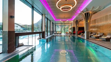 Indoor pool, 2 outdoor pools, open 7:00 AM to 9:00 PM, pool umbrellas
