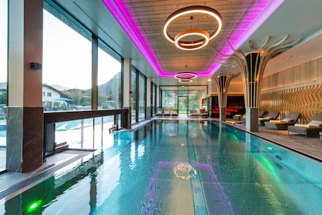 Indoor pool, 2 outdoor pools, open 7:00 AM to 9:00 PM, pool umbrellas