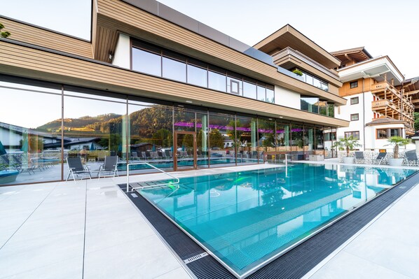 Indoor pool, 2 outdoor pools, open 7:00 AM to 9:00 PM, pool umbrellas