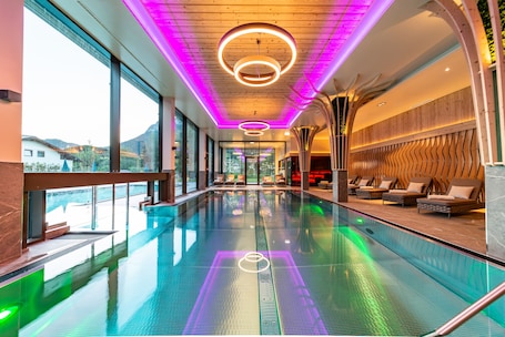 Indoor pool, 2 outdoor pools, open 7:00 AM to 9:00 PM, pool umbrellas