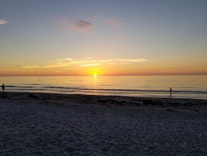 On the beach, sun-loungers, beach towels