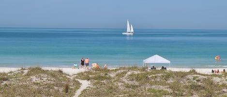 On the beach, sun-loungers, beach towels