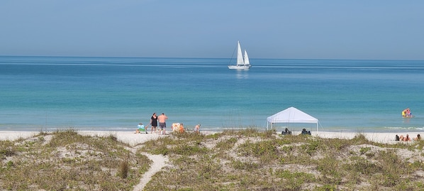 On the beach, sun-loungers, beach towels