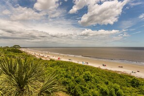 On the beach, sun loungers, beach towels