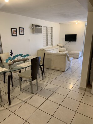 Family Apartment, 2 Bedrooms, Beach View | Living room | Flat-screen TV