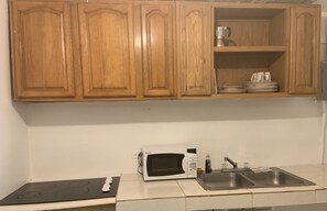 Family Apartment, 2 Bedrooms, Beach View | Private kitchen | Fridge, microwave, coffee/tea maker, cookware/dishes/utensils
