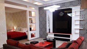 Business Suite, 1 King Bed (201) | Living area | Flat-screen TV - King David Hotel (Kutaisi)