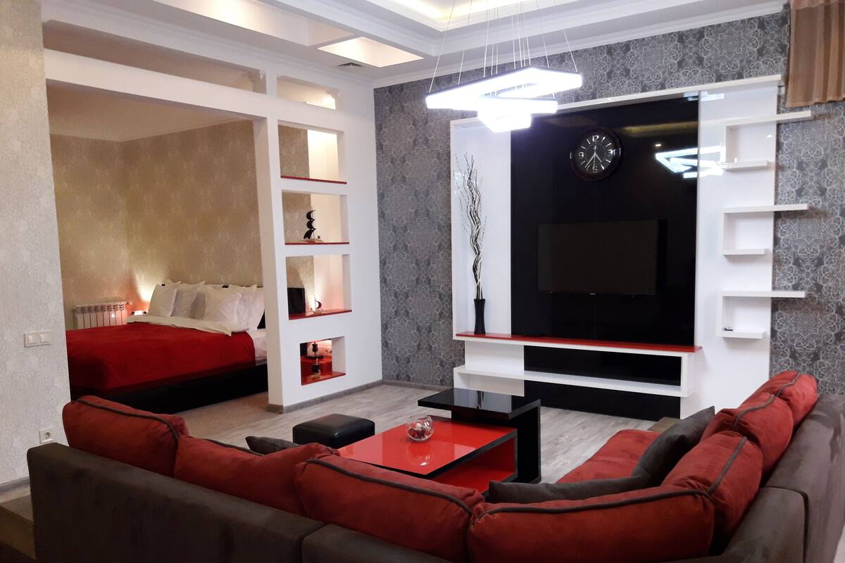 Suite – business, 1 kingsize-seng (201) | Oppholdsområde | Flatskjerm-TV