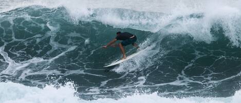 A surfer riding a wave.