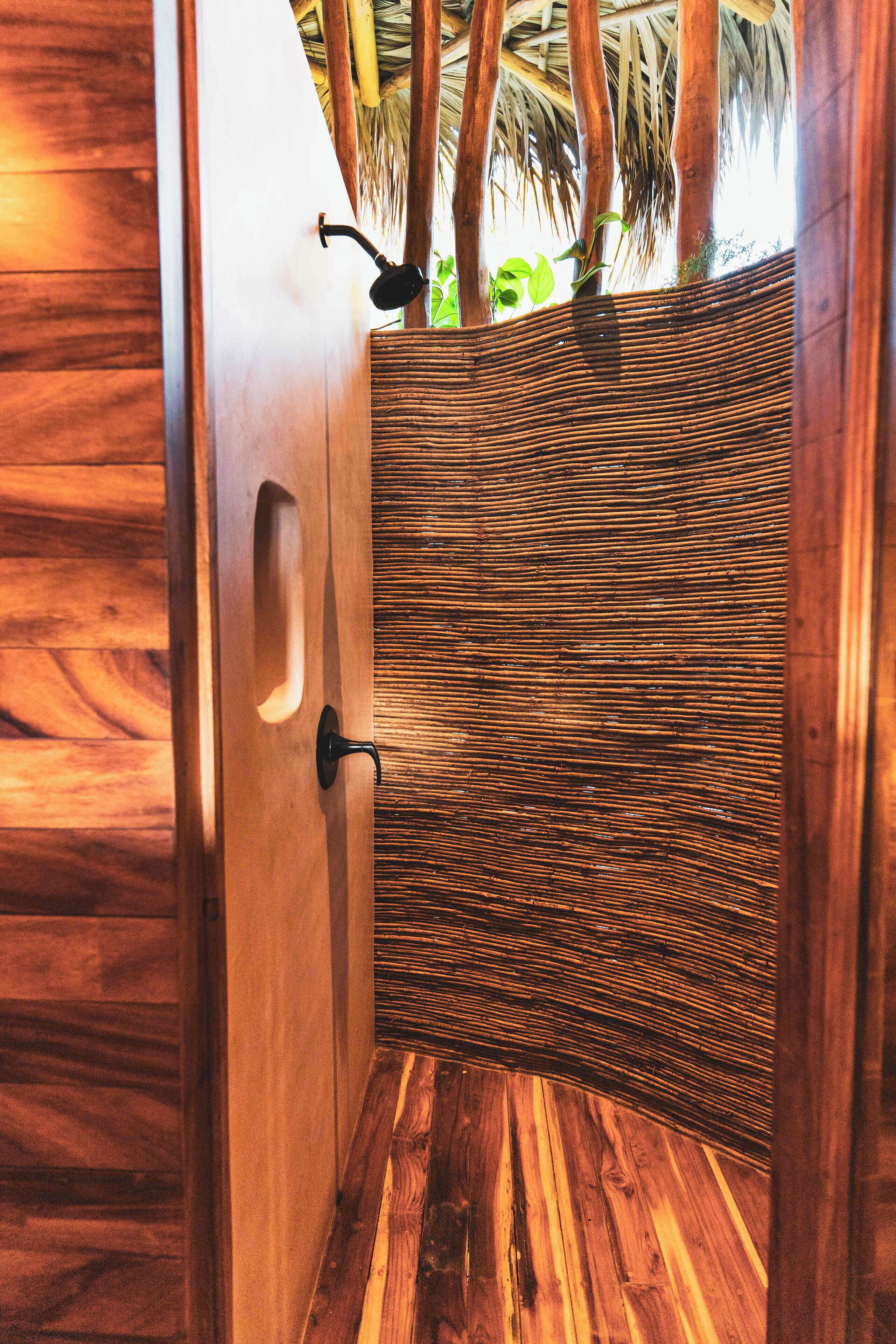 ocean view treehouse | bathroom | shower, rainfall showerhead, free toiletries, hair dryer