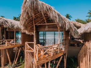 Beachfront Treehouse | Premium bedding, minibar, in-room safe, bed sheets