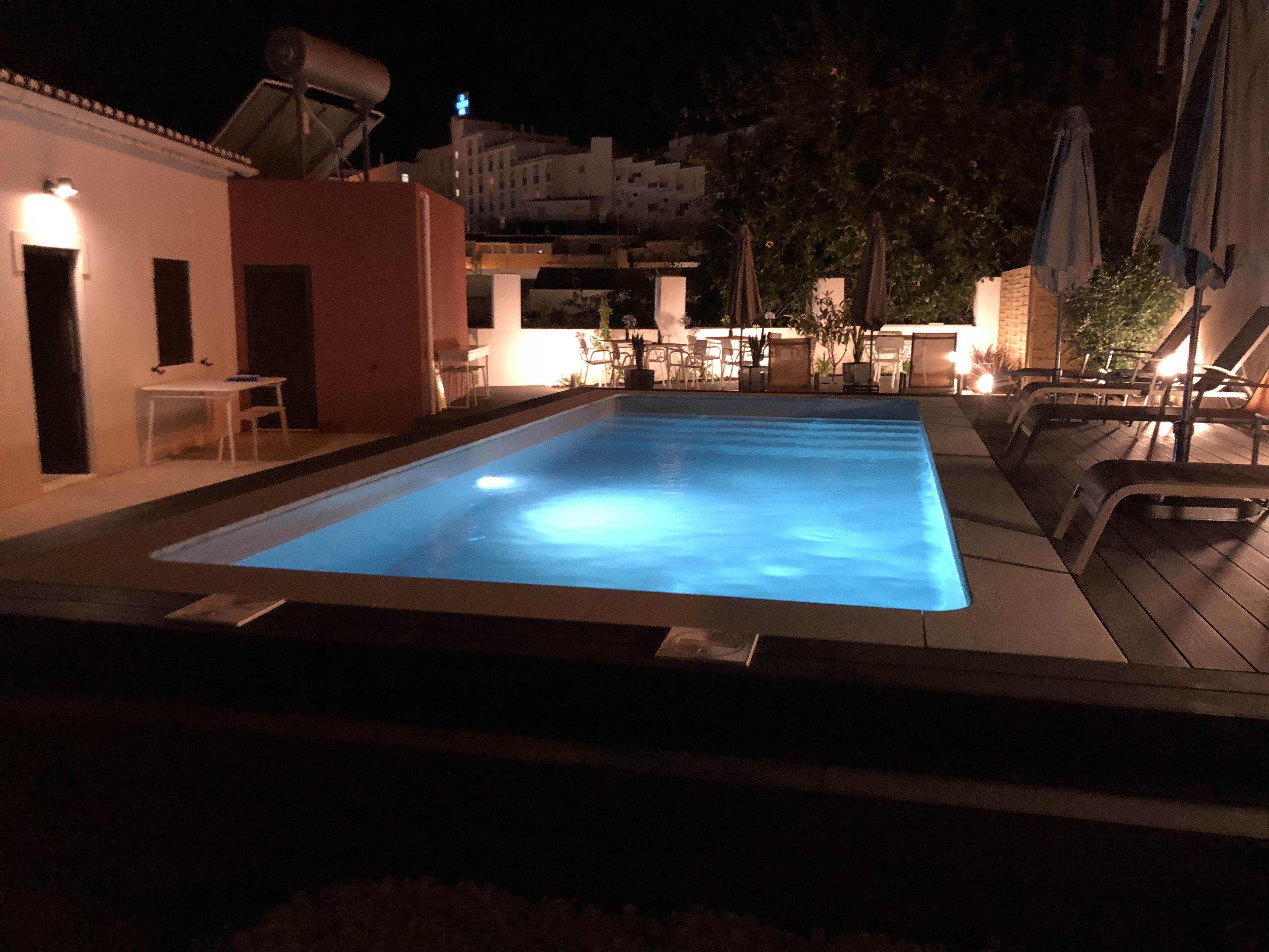 Outdoor pool, pool umbrellas, sun loungers