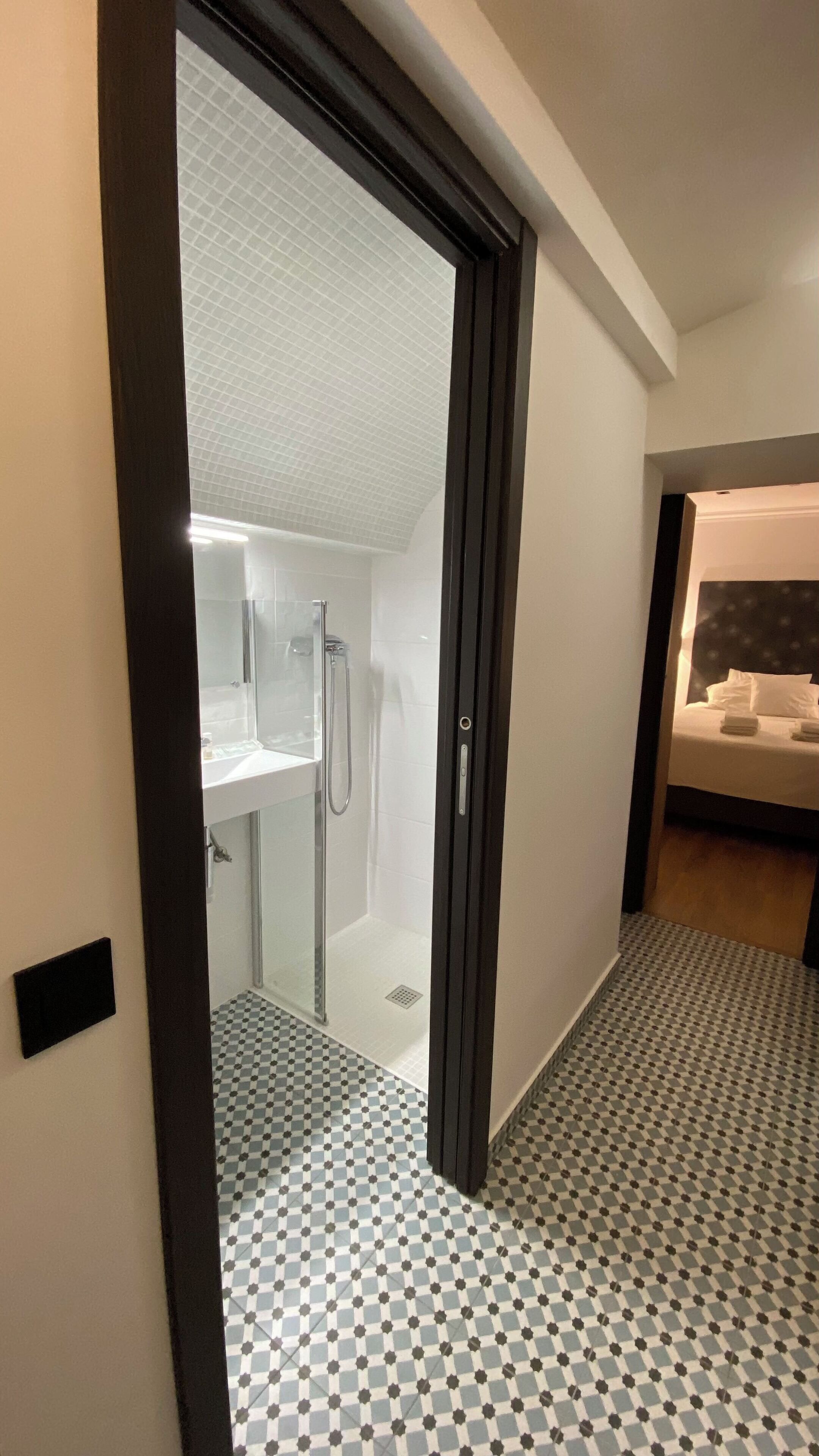 Economy Apartment, 1 Queen Bed, Private Bathroom, City View | Bathroom | Shower, rainfall showerhead, free toiletries, hair dryer