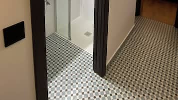 Economy Apartment, 1 Queen Bed, Private Bathroom, City View | Bathroom | Shower, rainfall showerhead, free toiletries, hair dryer