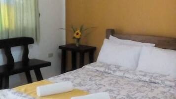 Deluxe Room, Private Bathroom, Poolside | Desk, bed sheets