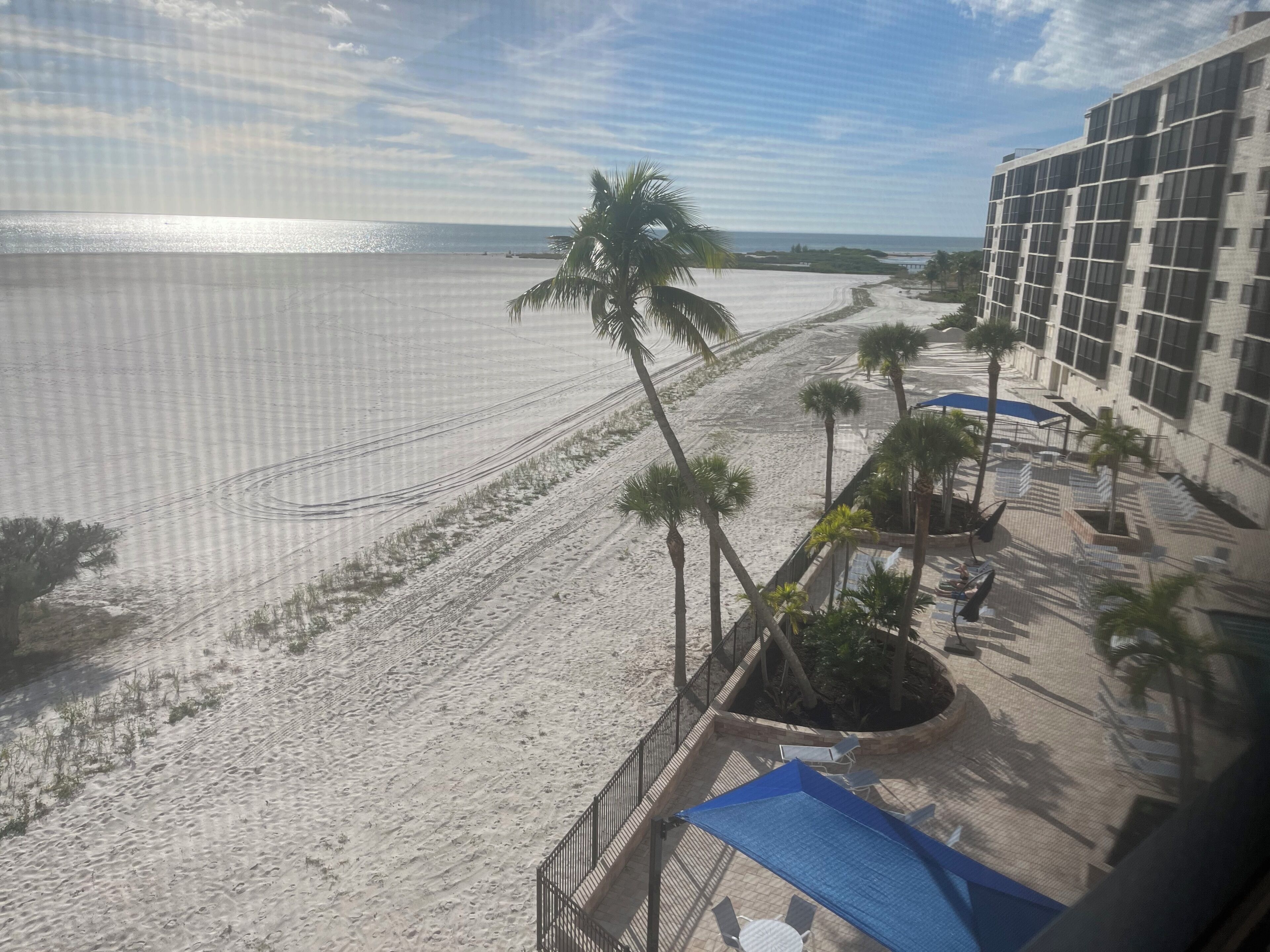 On the beach, sun-loungers