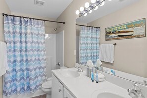 Combined shower/tub, towels, soap, shampoo
