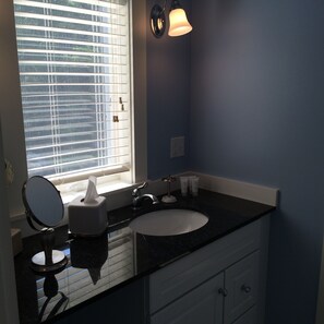 Combined shower/bathtub, hair dryer, towels, soap