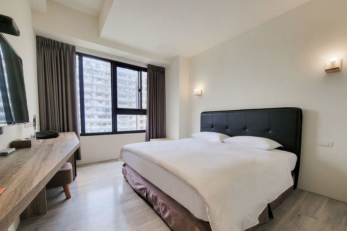 Premium bedding, pillowtop beds, desk, laptop workspace
