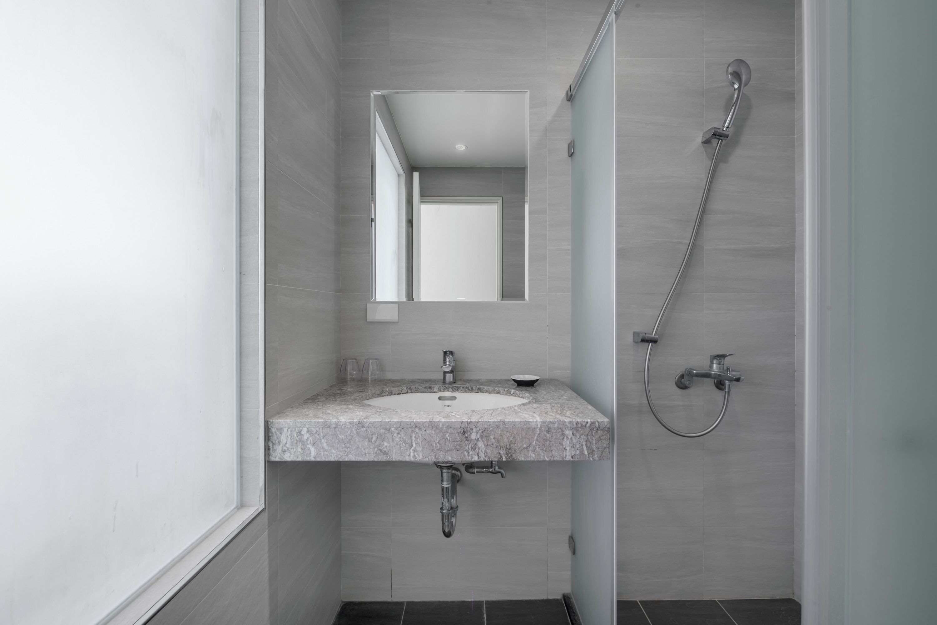 standard double room | bathroom | shower, rainfall showerhead, hair dryer, bidet