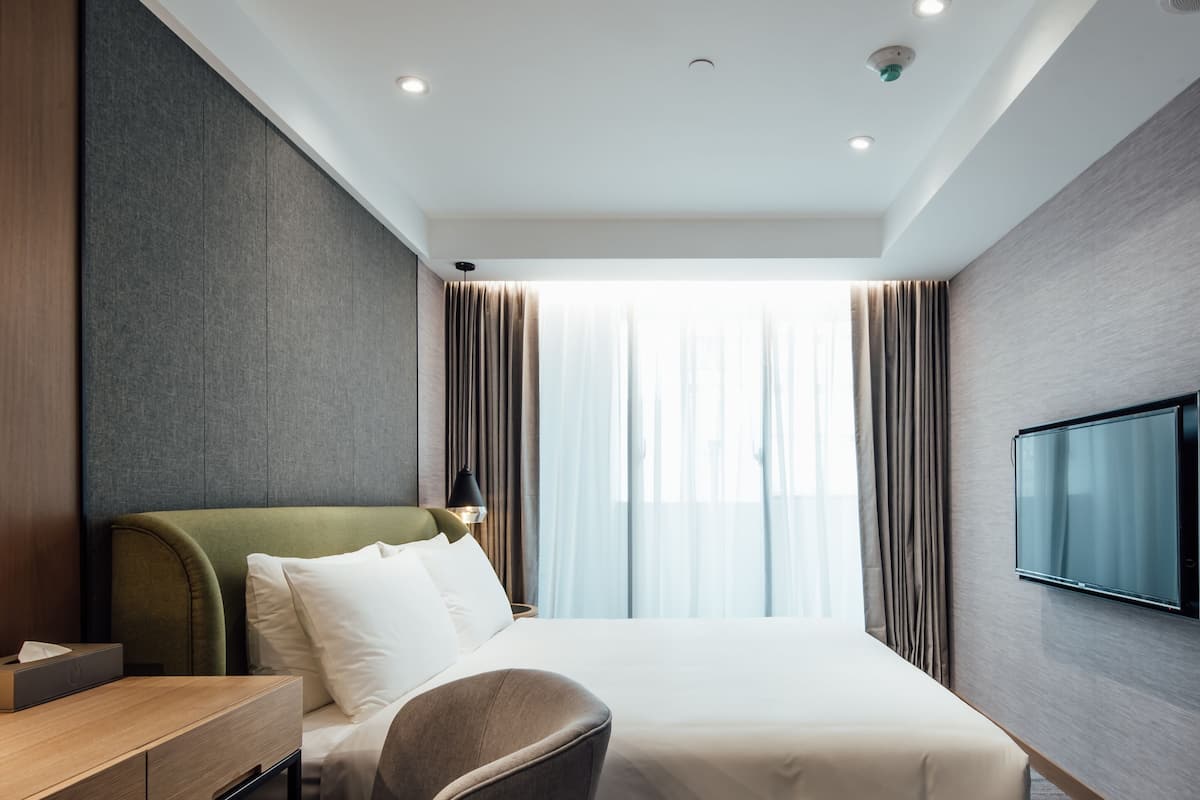 Luxe beddengoed, een kluis op de kamer, individueel gemeubileerd