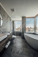 Luxury Double Room, River View | Bathroom | Free toiletries, hair dryer, slippers, towels