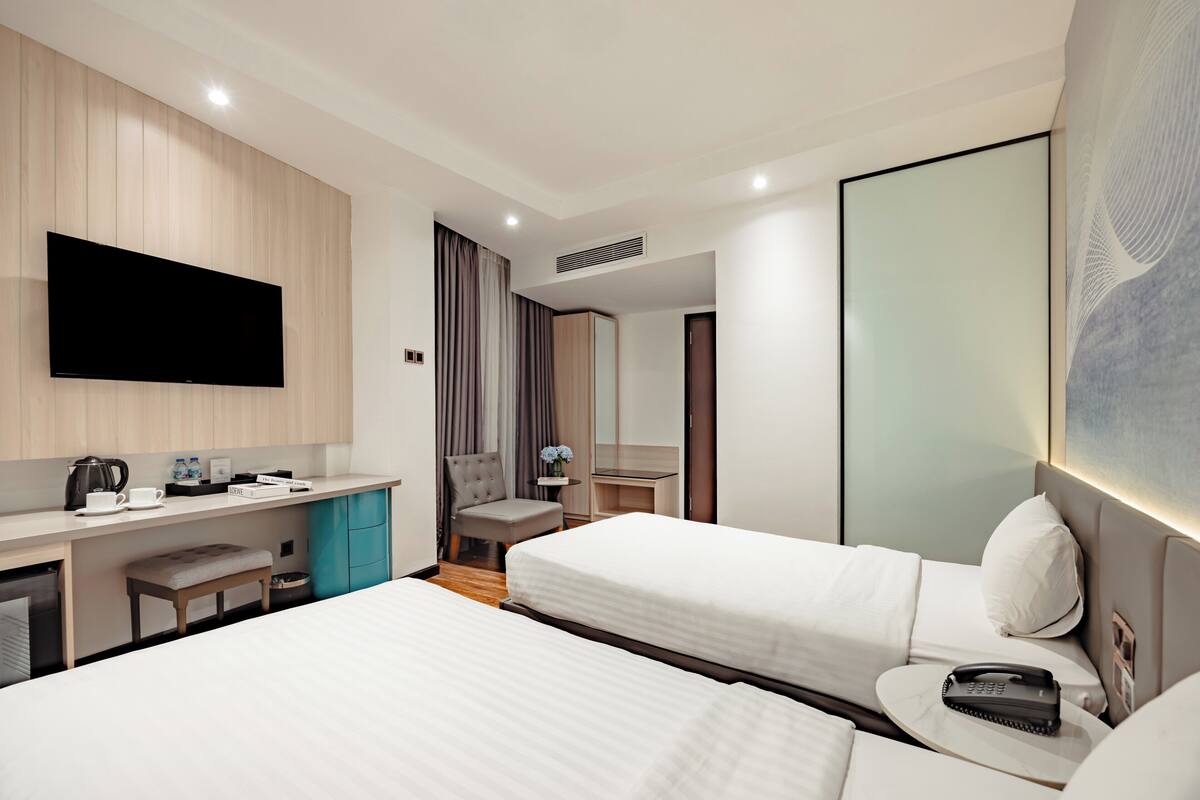 Twin Room, City View | Minibar, in-room safe, desk, free WiFi