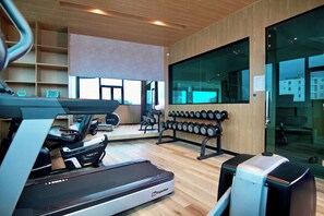 A gym with treadmills, dumbbells, and exercise equipment. - Cicilia Saigon Center (Ho Chi Minh City)